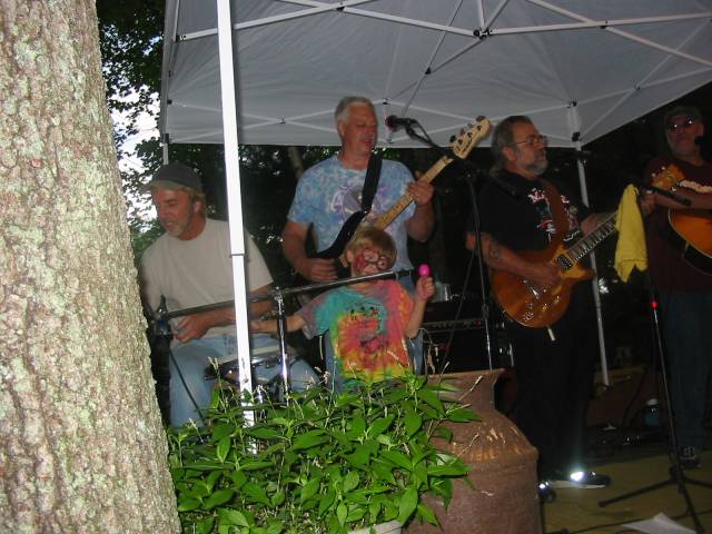 Another Summer Party with the Lighten' Brothers, with a hippy kid running around stage...